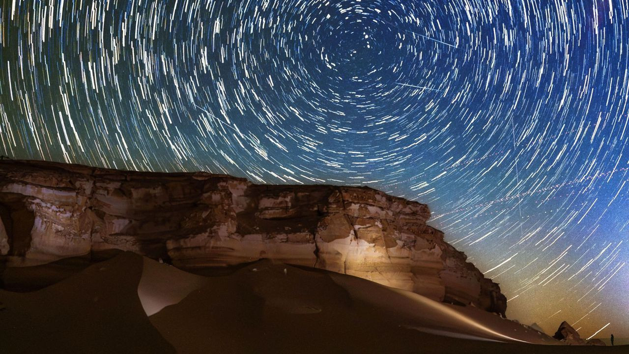 Perseid meteors meet mesmerizing star trails over Egypt's Western Desert