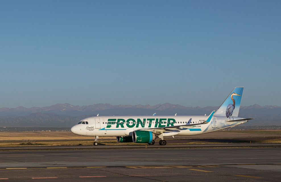 Frontier touts fuel efficiency as it lowers earnings outlook