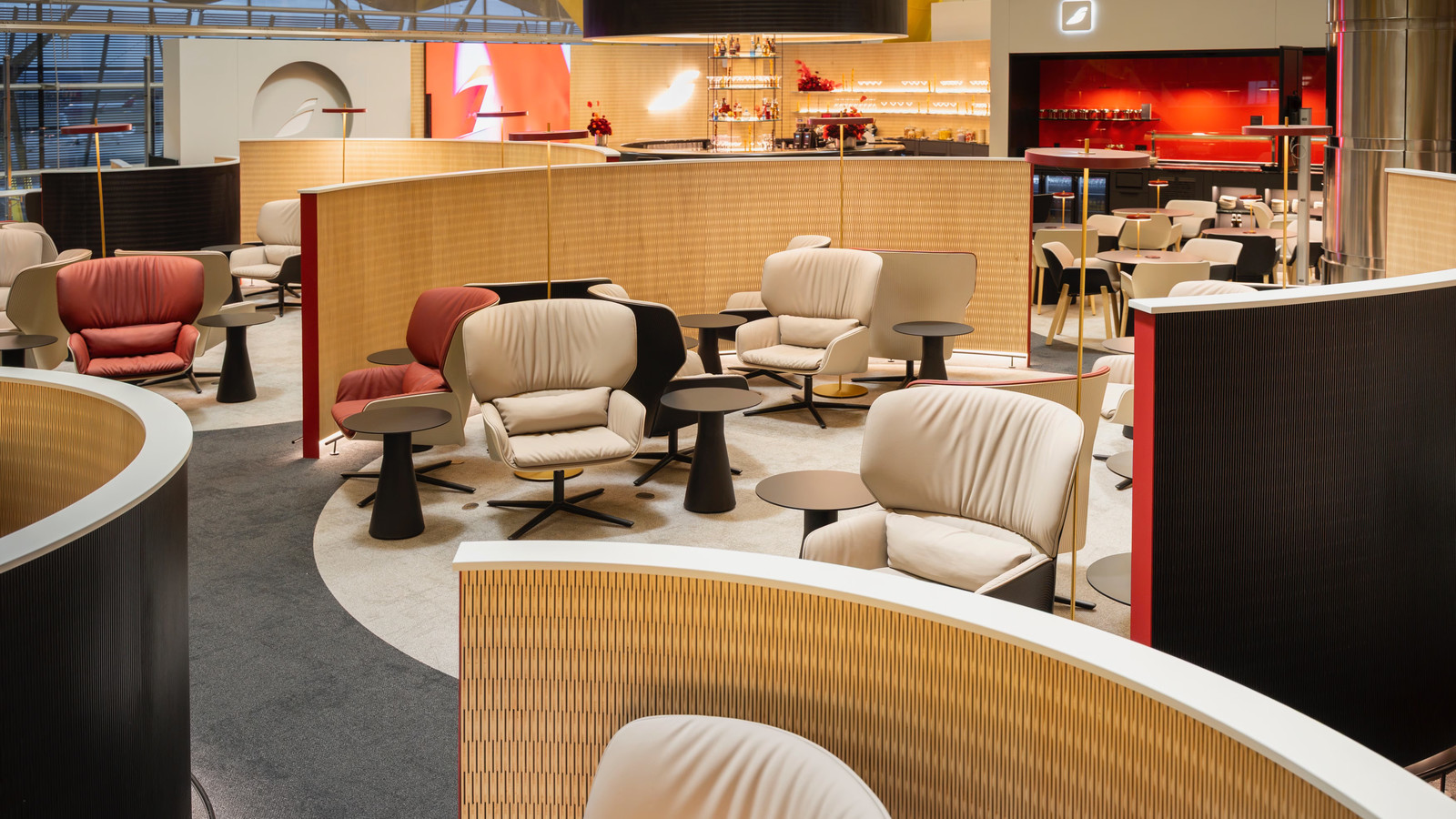 Inside Iberia's New 800-Square-Meter Madrid Lounge With Private Rest Suites & A 360-Degree Bar