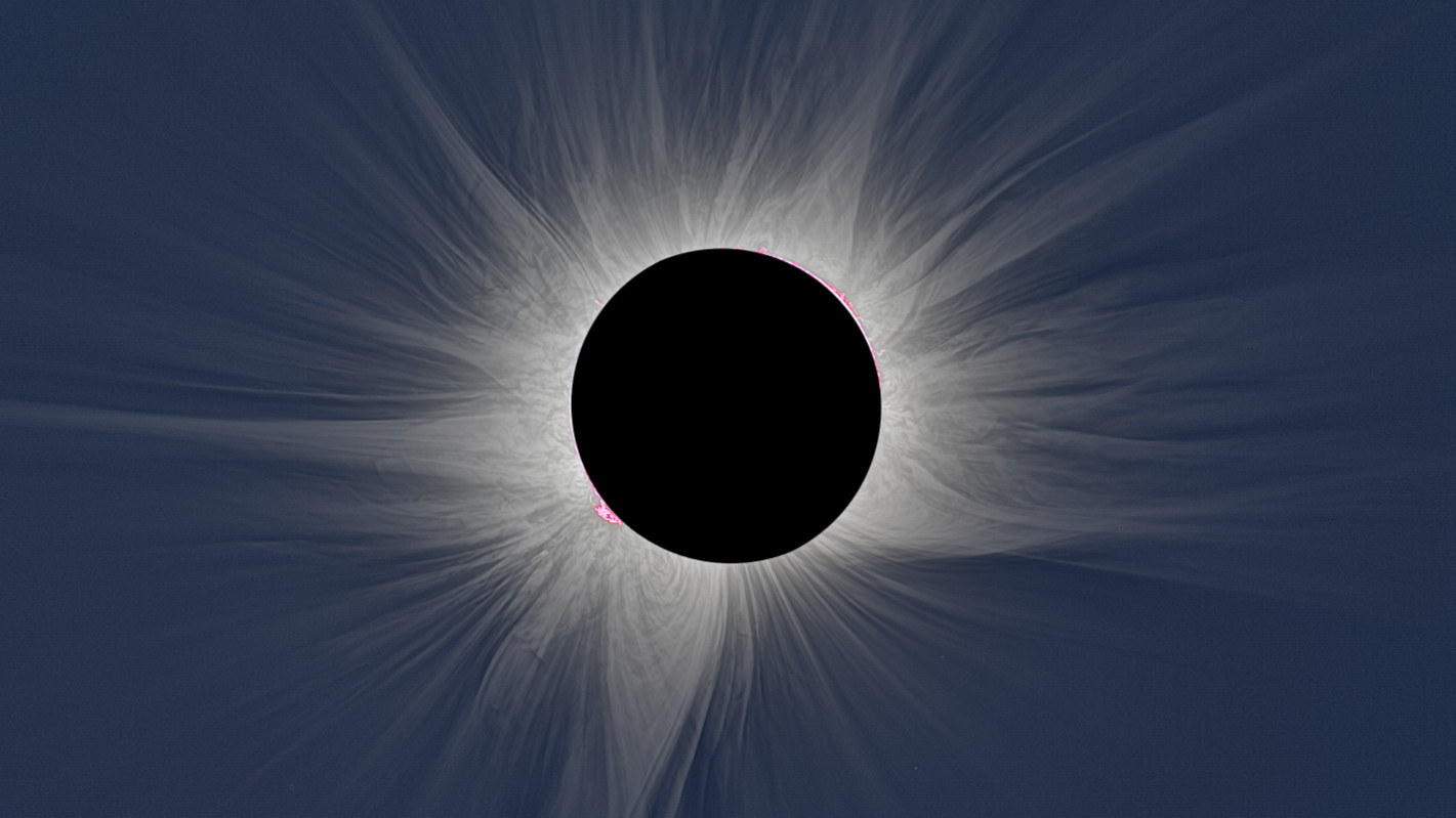 Stunning solar eclipse photos reveal giant hole and mysterious 'smoke rings' in the sun's atmosphere