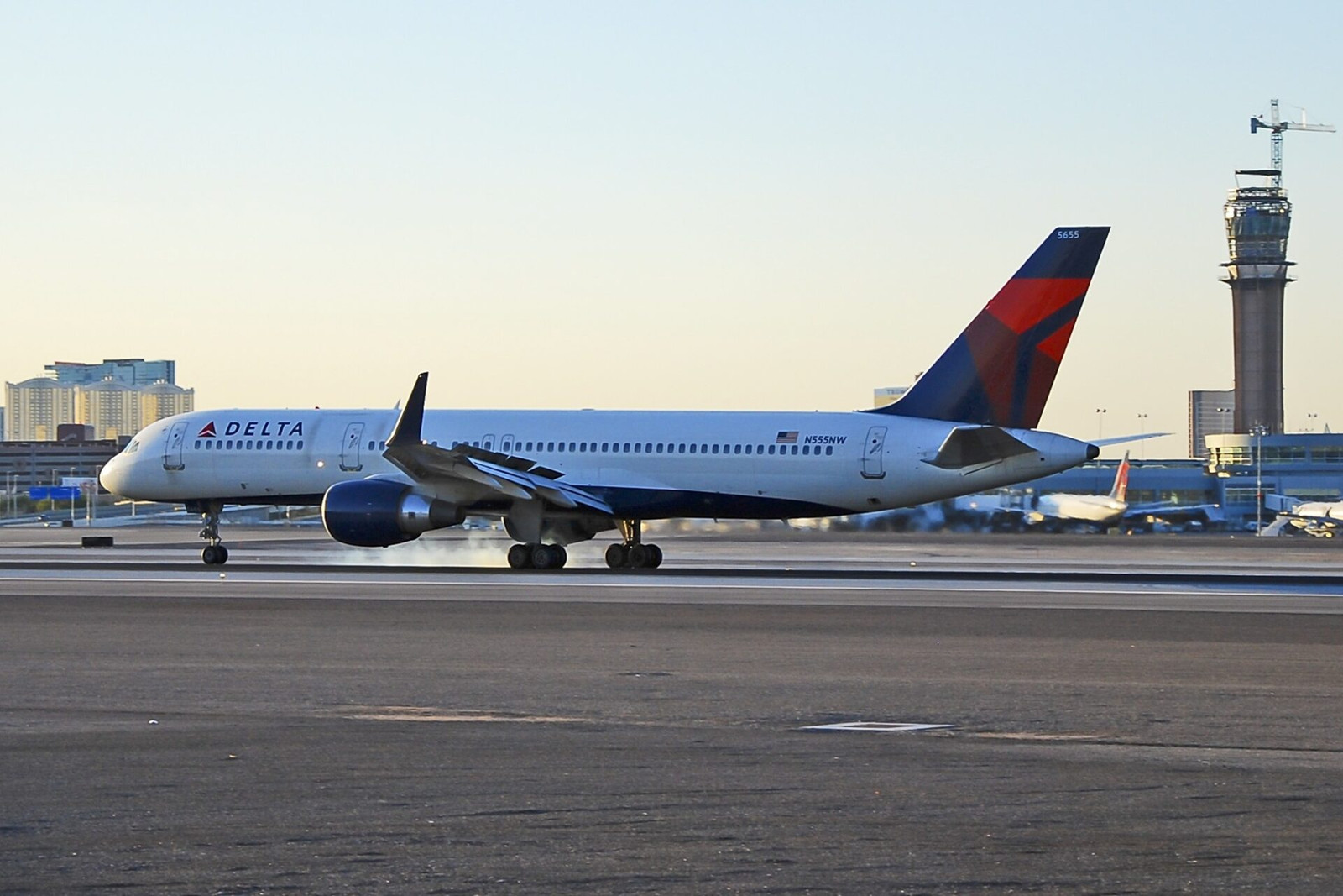 Delta passengers evacuate on escape slides after emergency landing