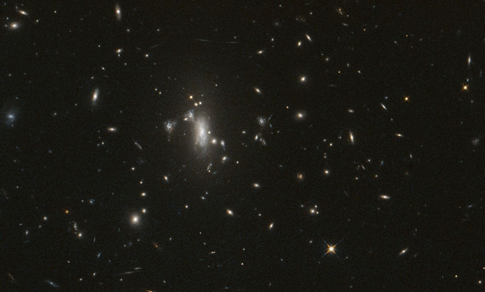 NASA’s Hubble Seeks Lensed Supernova, Marks 200,000 Orbits