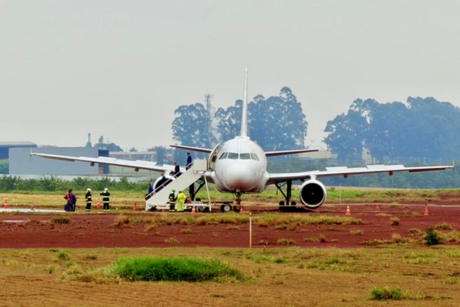 LATAM Airbus A320 runs off runway during landing in heavy rain in Brazil