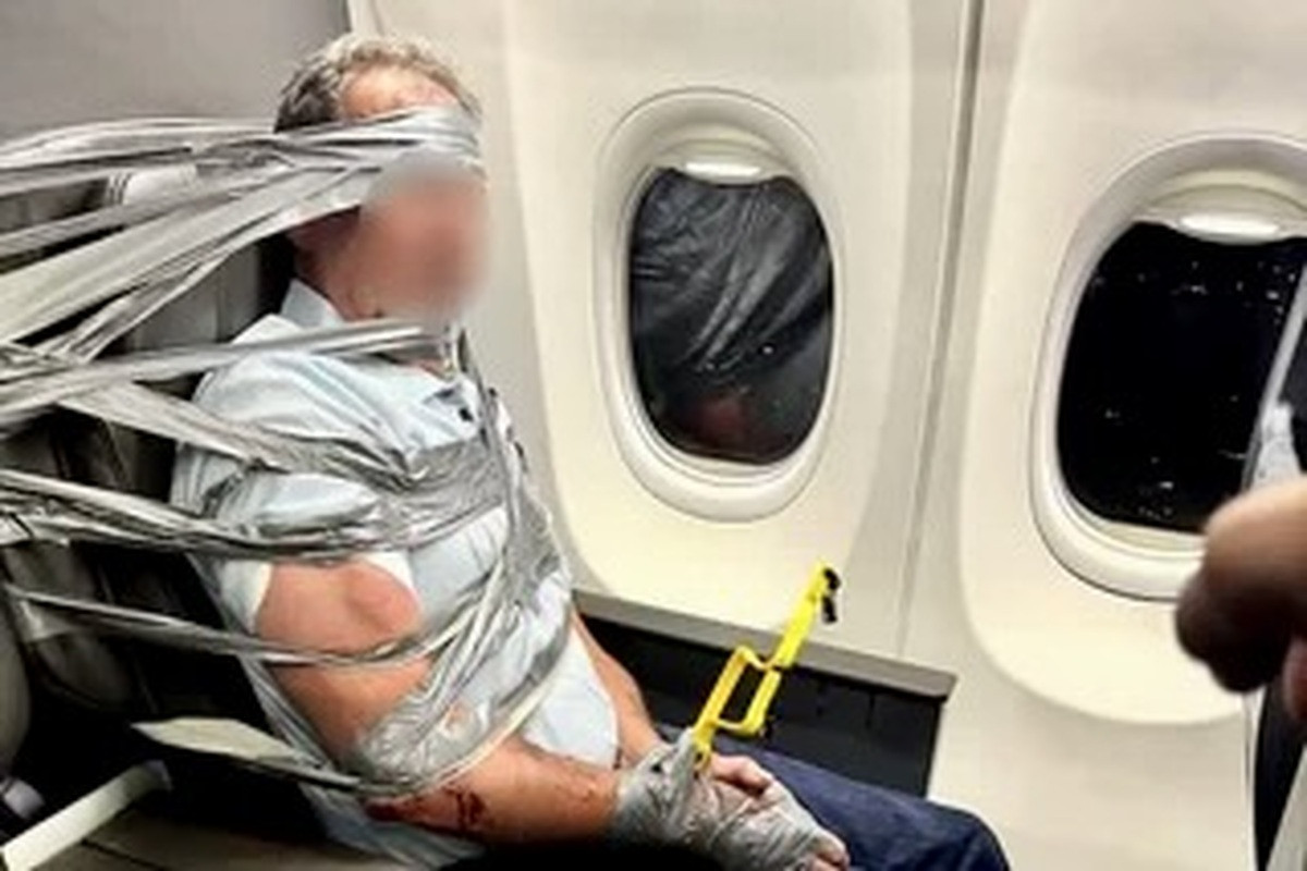 Passengers duct-tape disruptive man to seat as American Airlines flight diverts
