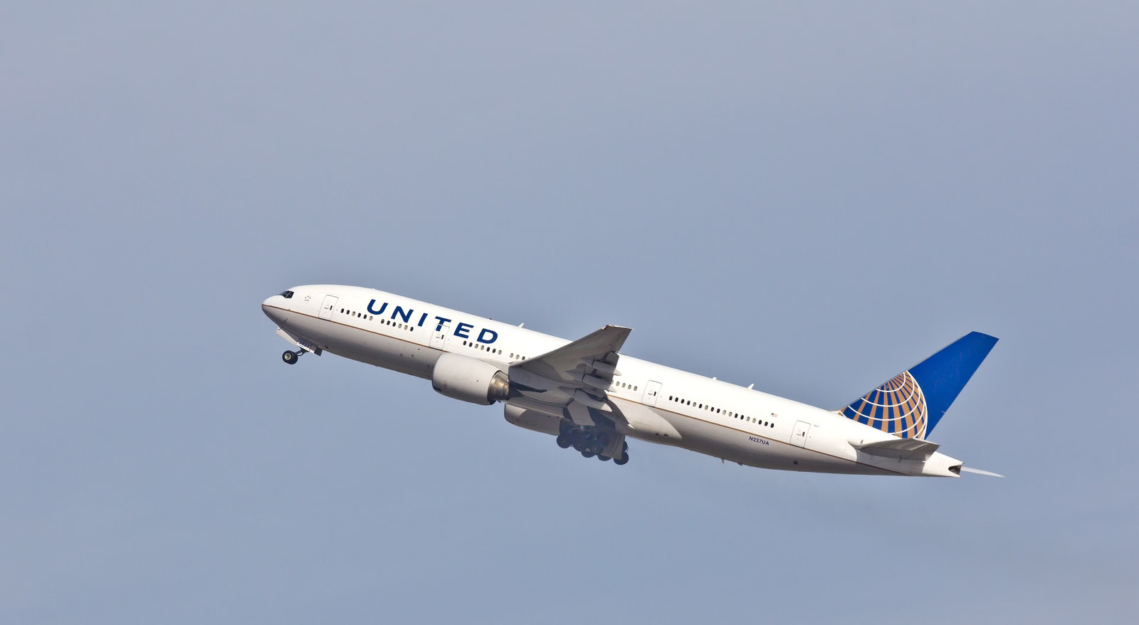 Drunk United Airlines Passenger Tries To Open Door Mid-Flight, Then Bites Flight Attendant