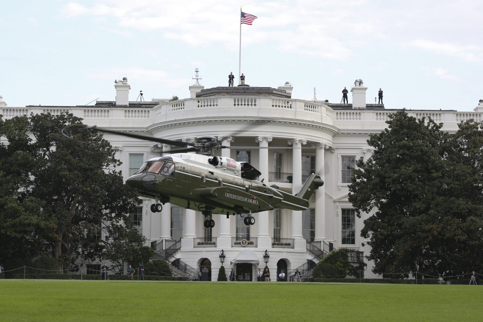 Trump unveils granite helipad to protect lawn from new Marine One