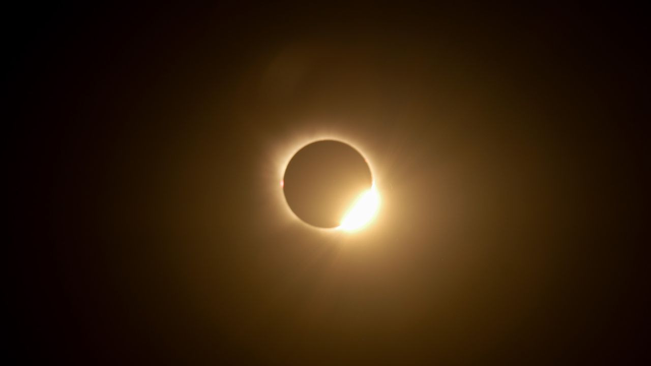 A black star in a false Spanish twilight: Here's the story of my 1st total solar eclipse