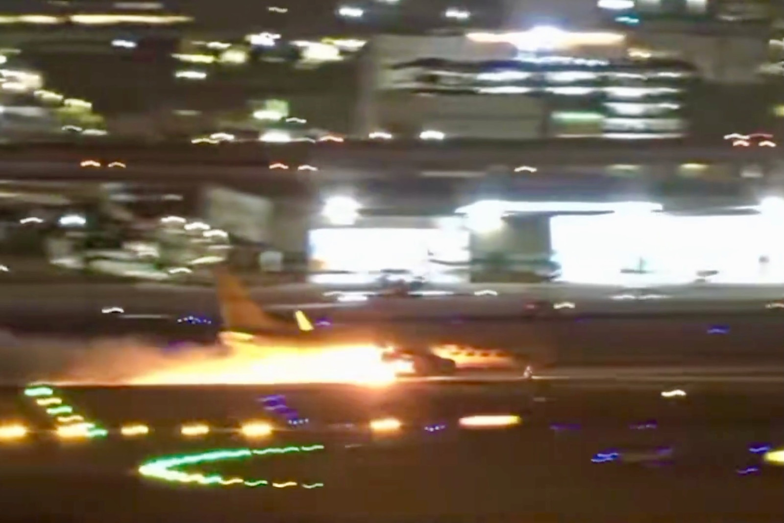 Video: Wheels of DHL Boeing 737 freighter erupt in flames during landing at LAX