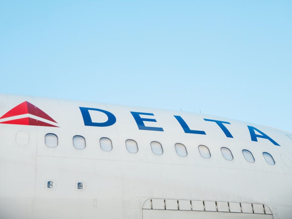 Delta third-quarter net profit almost halves as fuel bill soars