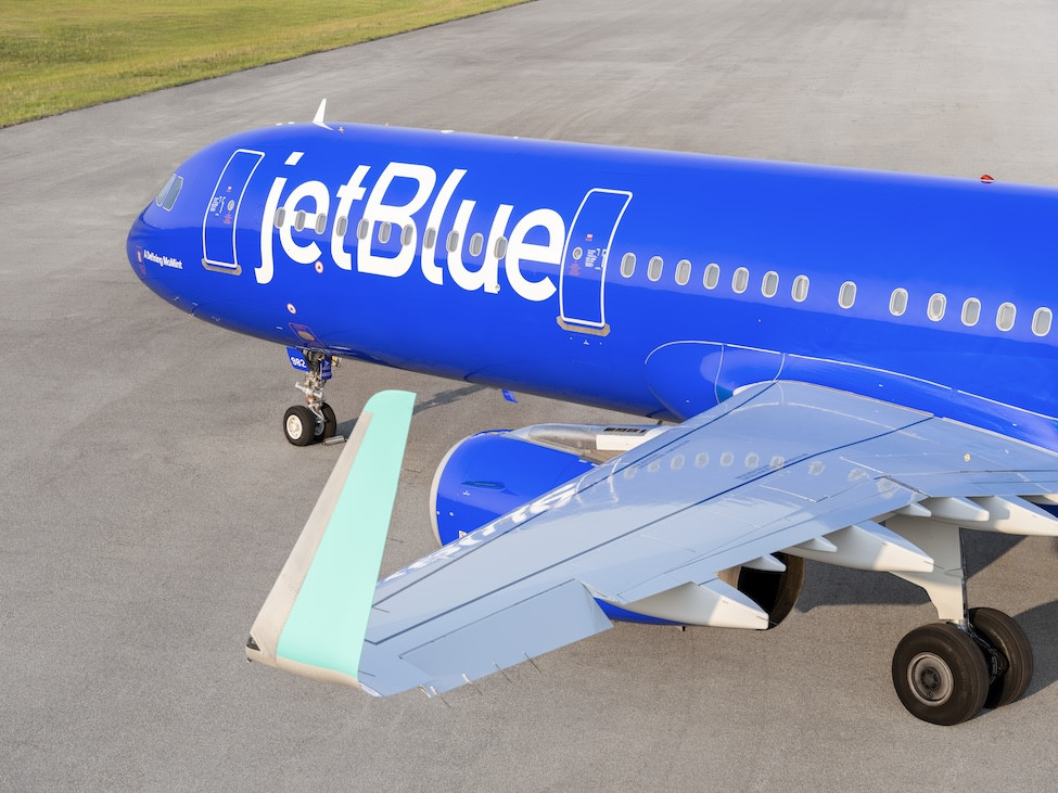 JetBlue cuts growth plans, raises revenue guidance