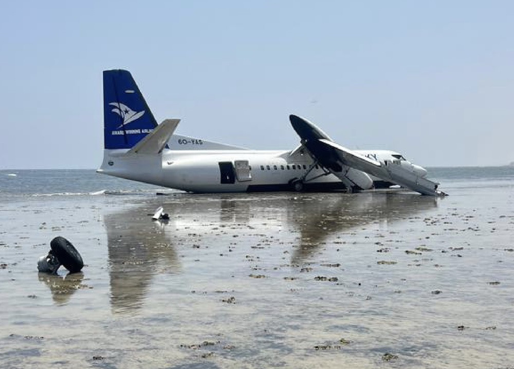 Overrun Fokker 50 in Somalia lost engine torque during climb
