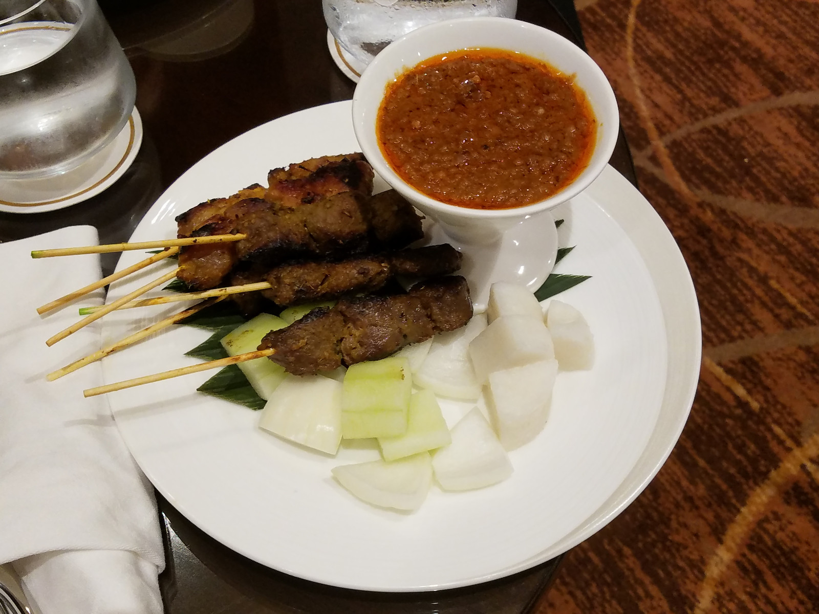 Pop Star Says Singapore Airlines Satay Left A 1.5-Inch Wood Shard In Her Throat—Now She Can’t Sing